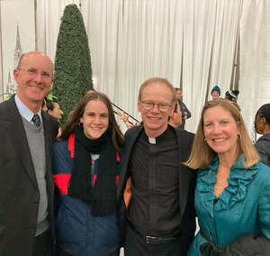 Julia and her parents with president-elect Rev. Robert A. Dowd, C.S.C.