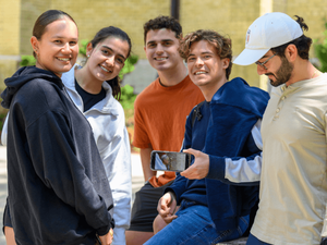 students watching election on phone