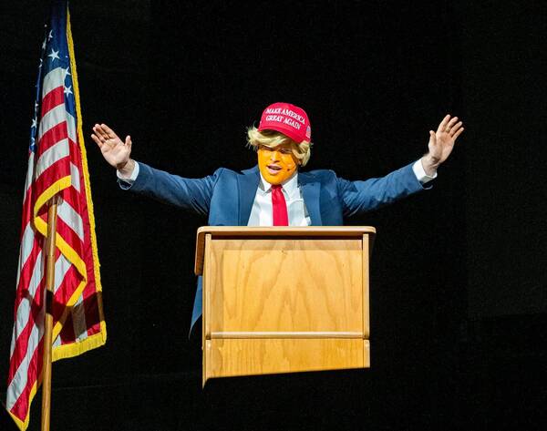 Photo of boy dressed up as Trump