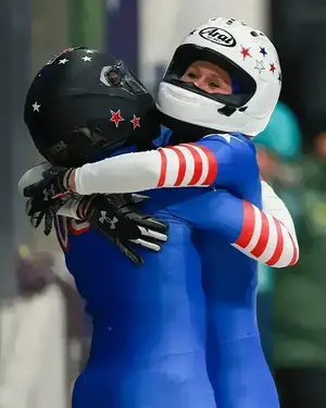 O'Brien hugs bobsledding partner